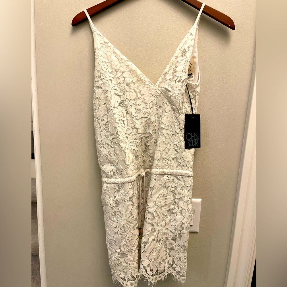 Cream lace romper by Chaser